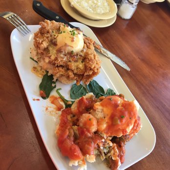 Ruby Slipper Orange Beach - The Peacemaker...Fried Chicken Benedict and the shrimp w/creole sauce Benedict.  Side of grits, we'll just because! - Cafes Near Me - Orange Beach, Alabama