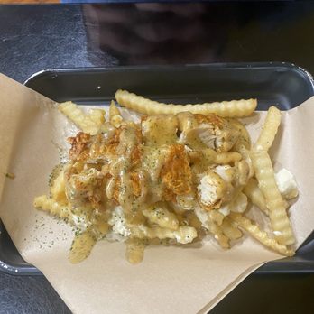 Pecker’s Chicken - Chicken poutine- spicy chicken, fries, and a sage gravy - Chicken Shop Near Me - Eureka Springs, Arkansas