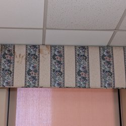 Lexington Medical Center Emergency Dept - Patient room window valance stained and dirty. Probably 40 years old.