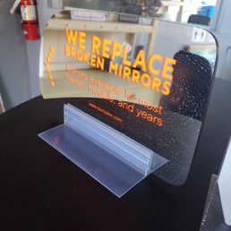 Advertisement sign, they also replace broken windows. Advertisement sign, they also replace broken windows.
