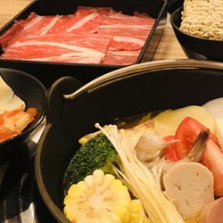 Centre Street Japanese Hotpot - Hot pot with sliced beef and a selection of ingredients.
