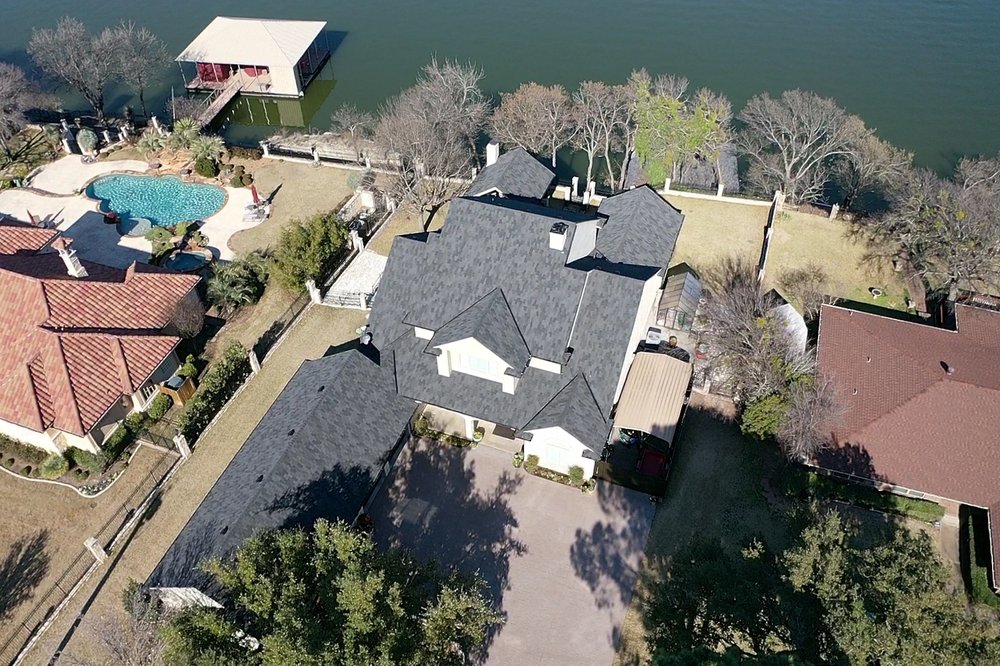 Slide of Cowtown Roofing