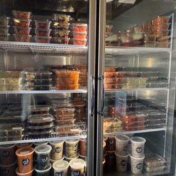 Oh Mama Kitchen - big assortment of Korean prepared foods, sides and pickles in the refrigerated section - Korean Near Me - La Mirada, California