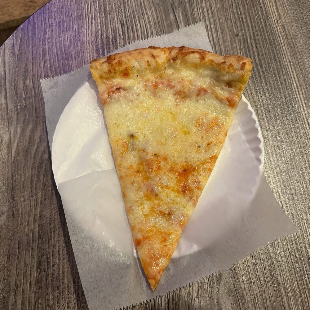 Mela Pizza House - Cheese Slice - Pizza Near Me - Astoria, New York Mela Pizza House - Cheese Slice - Pizza Near Me - Astoria, New York