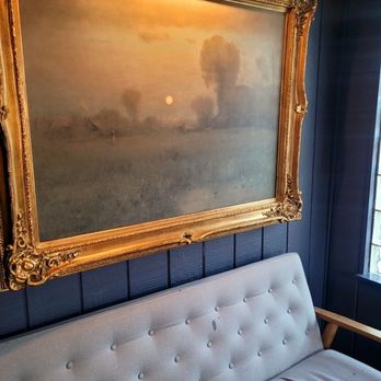 The Black Salt - a painting hanging on the wall - Cocktail Bars Near Me - Hamtramck, Michigan