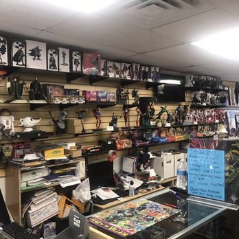 Madness Comics And Game - Counter wall area - Comic Books Near Me - Denton, Texas Madness Comics And Game - Counter wall area - Comic Books Near Me - Denton, Texas