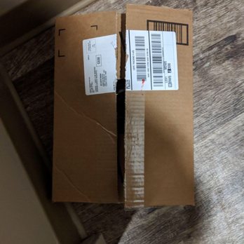 Elgin Tower - Opened package in "package room" - Apartments Near Me - Elgin, Illinois