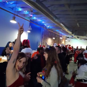 Echoes - a group of people dressed in santa hats - Music Venues Near Me - Albuquerque, New Mexico