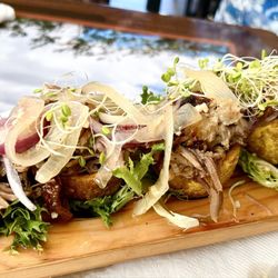 Nini’s Cuban - Tostones rellenos (pork)