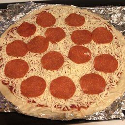 In-baked pizza- it covers the oven rack! In-baked pizza- it covers the oven rack!