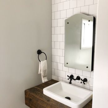 VIP Remodeling - 1/2 bathroom with custom wood countertop - General Contractors Near Me