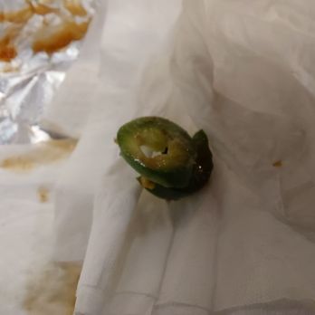 Five Guys - Jalapeno peppers that were added to my burger on the bottom bun along the edge. - Burgers Near Me - Spokane, Washington Five Guys - Jalapeno peppers that were added to my burger on the bottom bun along the edge. - Burgers Near Me - Spokane, Washington