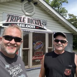 Two Michigan bikers cheesin' for the camera.