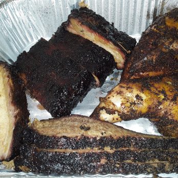 J Wild's - We got the 4 meat family meal which consisted of 4 types of meats, with 4 sides. - Barbeque Near Me - Folsom, California
