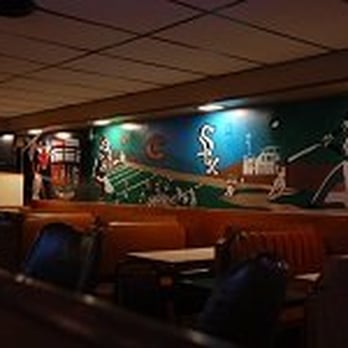 Rand Road House - Food area with painted sports mural - Sports Bars Near Me - Des Plaines, Illinois Rand Road House - Food area with painted sports mural - Sports Bars Near Me - Des Plaines, Illinois