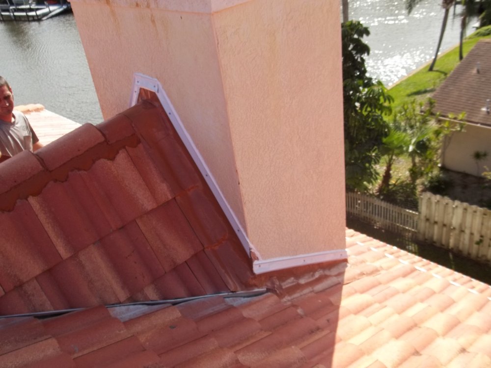 Slide of J K Behan Roofing