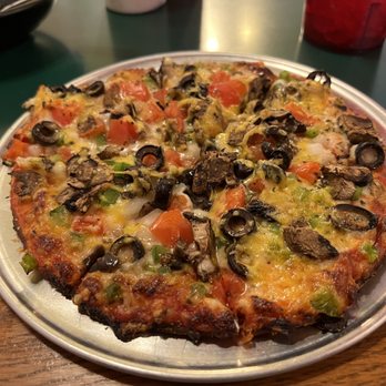 Monical's Pizza - a pizza with mushrooms and tomatoes - Pizza Near Me - Lafayette, Indiana