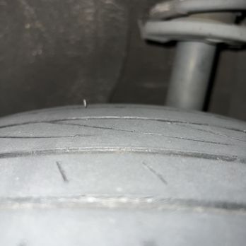AutoNation USA - Wires coming out of rear tire - Car Dealers Near Me - Houston, Texas
