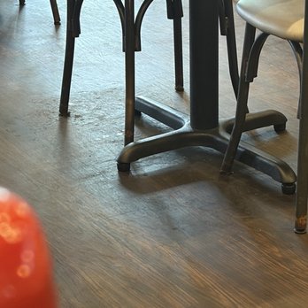Another Broken Egg Cafe - Dirty floor clearly showing they don't move chairs to mop. No way the floor can be that gross for only being open for a couple hours. - Breakfast & Brunch Near Me - Winter Park, Florida Another Broken Egg Cafe - Dirty floor clearly showing they don't move chairs to mop. No way the floor can be that gross for only being open for a couple hours. - Breakfast & Brunch Near Me - Winter Park, Florida