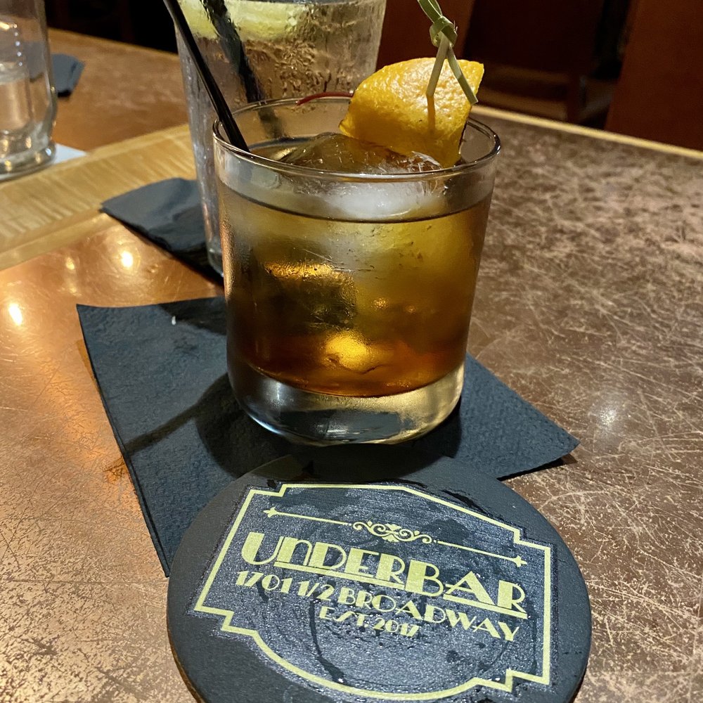 UnderBar - Old Fashioned ($10) with Bourbon, Bitters, Pure Maple Syrup, Orange Rind, and Bada Bing Cherry - Underbar - Speakeasies Near Me - Vancouver, Washington
