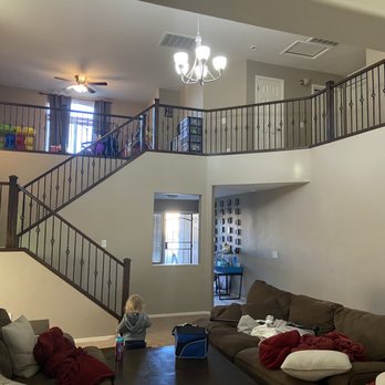 Artistic Stairs - a living room with a staircase - General Contractors Near Me - Tucson, Arizona