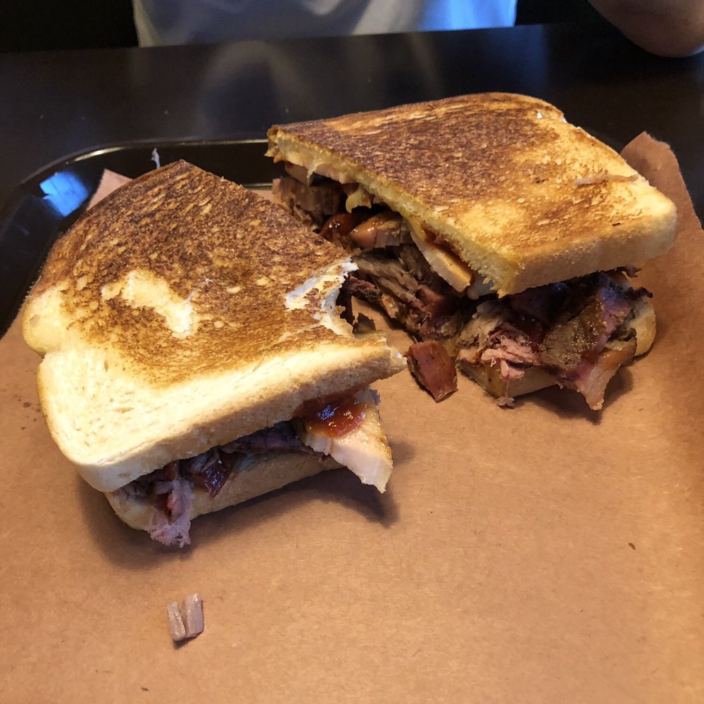 Rustlers BBQ - Big Jake sandwich- minus a little bite - Southern Near Me - Henryetta, Oklahoma Rustlers BBQ - Big Jake sandwich- minus a little bite - Southern Near Me - Henryetta, Oklahoma