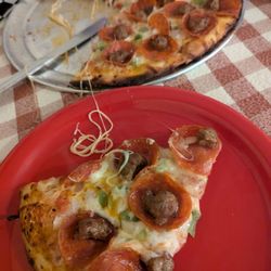 Vinny's New York Pizza - Vinny special pizza  Bell peppers, onions, pepperoni, Italian sausage