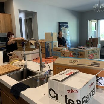 Camelback Moving - Movers carefully stacking boxes where we requested. - Movers Near Me - Phoenix, Arizona