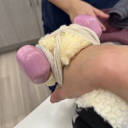 Lang Hand Therapy - Hang down with 2 lb weight / cushions atop and below with heat for nice stretch