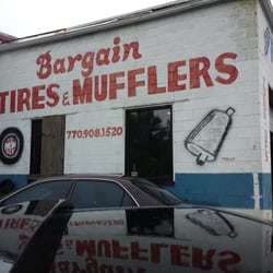 Bargain Used Tires - Side of building coming from the intersection of Brockett Rd  and Bancroft circle.