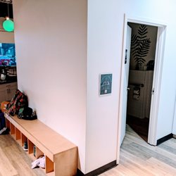 Black Swan Yoga Houston - Shoes Area / Bathroom
