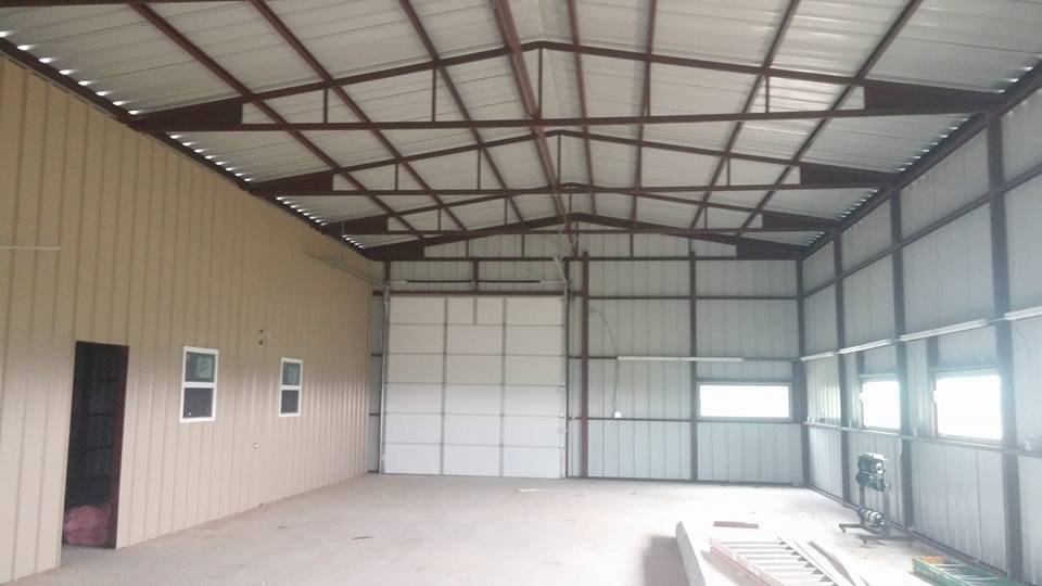 Slide of Hackett's Custom Siding and Metal Roofs