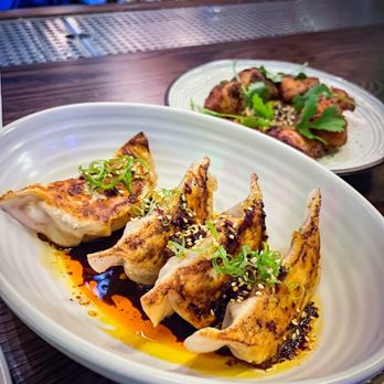 Nautilus Pier 4 - Szechuan lamb potstickers; Japanese fried chicken - Seafood Near Me - Boston, Massachusetts Nautilus Pier 4 - Szechuan lamb potstickers; Japanese fried chicken - Seafood Near Me - Boston, Massachusetts