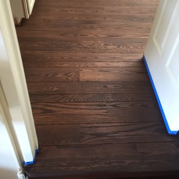 Steve Timmons Flooring - a hardwood floor being painted - Flooring Near Me Steve Timmons Flooring - a hardwood floor being painted - Flooring Near Me