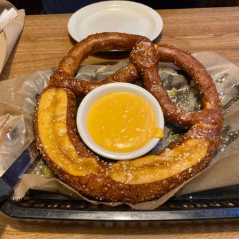 Dogs R Us - Giant pretzel with beer cheese - American Near Me - Titusville, Florida