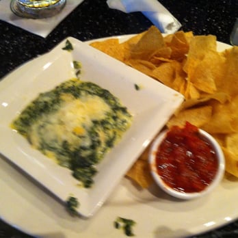 O'Charley's Restaurant & Bar - Spinach and artichoke dip with chips - American Near Me - Boardman, Ohio