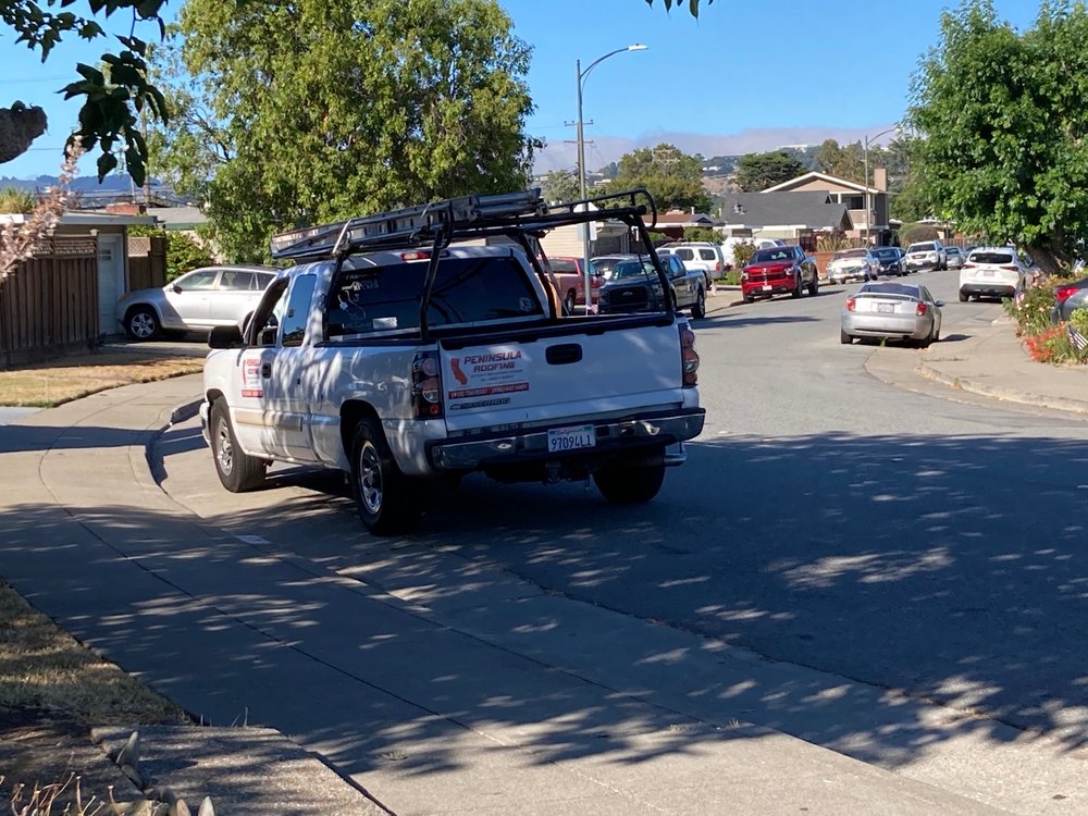 Slide of Peninsula Roofing
