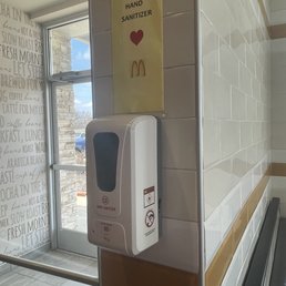 a paper towel dispenser on a wall