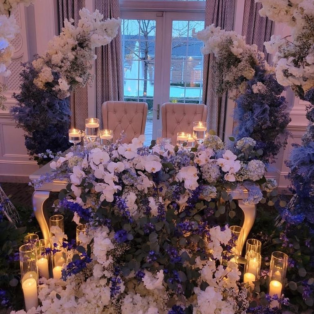 Ritz Walton Collection - Moon gate sweetheart table with cascading flowers. - Wedding Planning Near Me - Bloomfield, New Jersey Ritz Walton Collection - Moon gate sweetheart table with cascading flowers. - Wedding Planning Near Me - Bloomfield, New Jersey