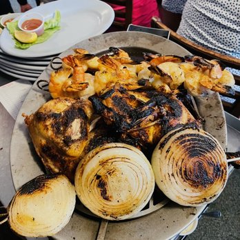 White Stag - grilled chicken and onions on a grill - Steakhouses Near Me - Rhinelander, Wisconsin