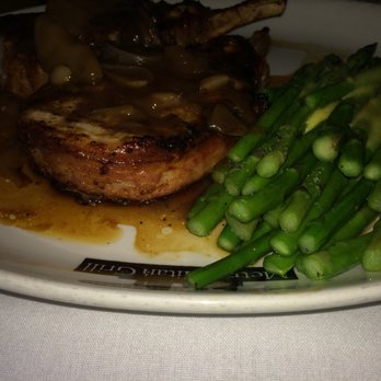 Metropolitan Grill - Pork Chops with asparagus.  Damn good !!!!!! - American Near Me - Seattle, Washington