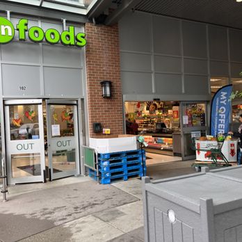 Save-On-Foods - ows a grocery store with a woman walking out of the door - Grocery Near Me - Burnaby, British Columbia