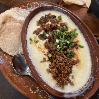 D' La Santa - Queso fundido with chorizo and mushroom - Mexican Near Me - Seattle, Washington D' La Santa - Queso fundido with chorizo and mushroom - Mexican Near Me - Seattle, Washington