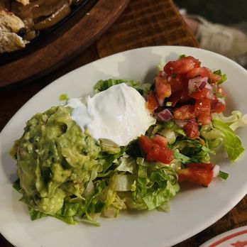 Helena’s - Fajita accoutrements. Decent dollop of fresh guacamole. - Mexican Near Me - Falls Church, Virginia Helena’s - Fajita accoutrements. Decent dollop of fresh guacamole. - Mexican Near Me - Falls Church, Virginia