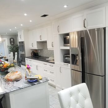 V Star Renovation - kitchen with stainless steel appliances - General Contractors Near Me