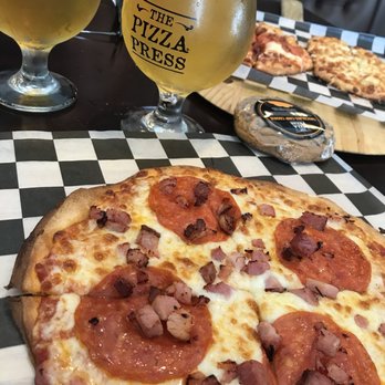 The Pizza Press - Celebration - Pizza Near Me - Kissimmee, Florida The Pizza Press - Celebration - Pizza Near Me - Kissimmee, Florida