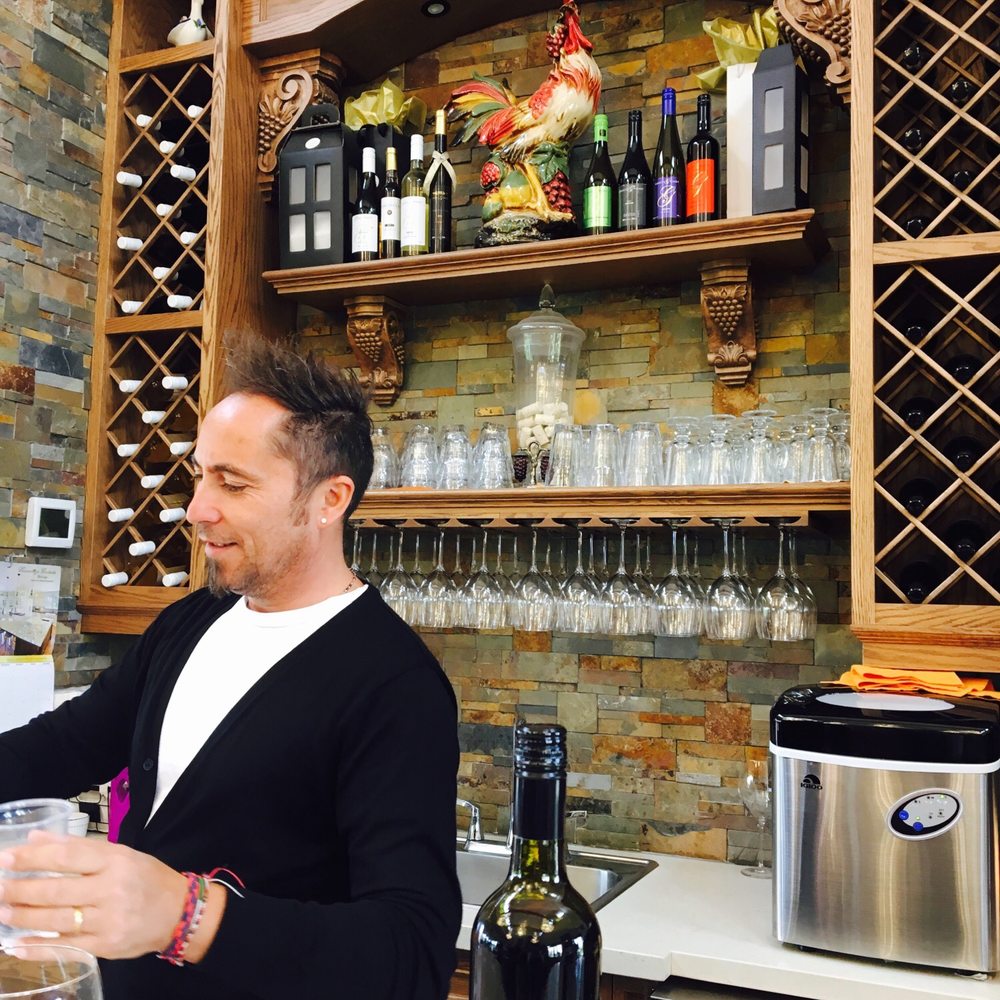 Gallucci Winery - a man pouring a glass of wine - Wine Tours Near Me - Whitchurch-Stouffville, Ontario Gallucci Winery - a man pouring a glass of wine - Wine Tours Near Me - Whitchurch-Stouffville, Ontario