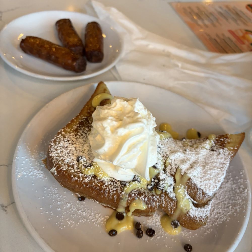 Mimosas - Cookie dough French toast with crème brûlée and side of sausage! - Breakfast & Brunch Near Me - Myrtle Beach, South Carolina Mimosas - Cookie dough French toast with crème brûlée and side of sausage! - Breakfast & Brunch Near Me - Myrtle Beach, South Carolina