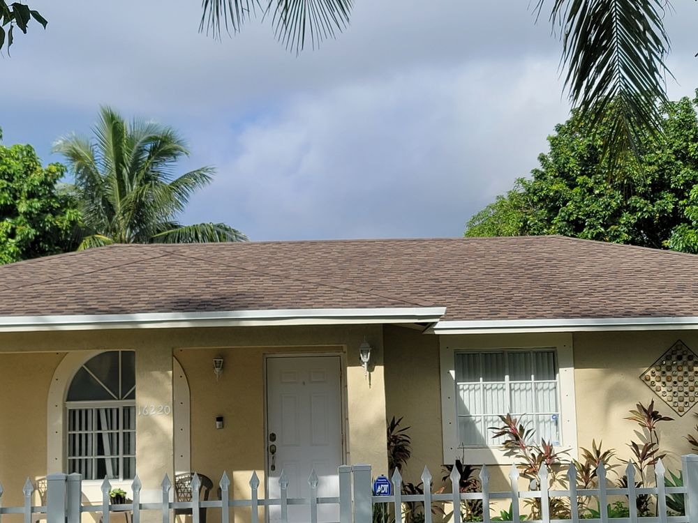 Slide of JMR Roofing Services