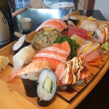 Hikari Japanese Restaurant - Sushi and sashimi platter (5 nigiri; 4 rolls; 6 mini rolls; 10 mixed sashimi) ($42). - Japanese Near Me - Queenstown, OTA Hikari Japanese Restaurant - Sushi and sashimi platter (5 nigiri; 4 rolls; 6 mini rolls; 10 mixed sashimi) ($42). - Japanese Near Me - Queenstown, OTA